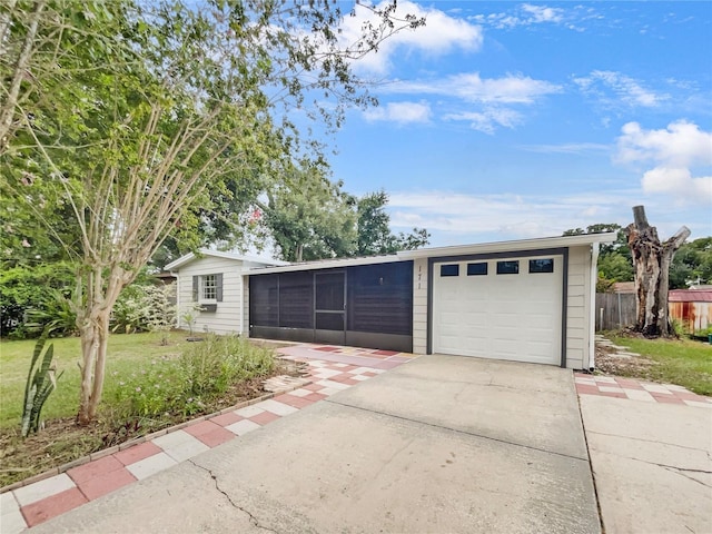 garage with a yard