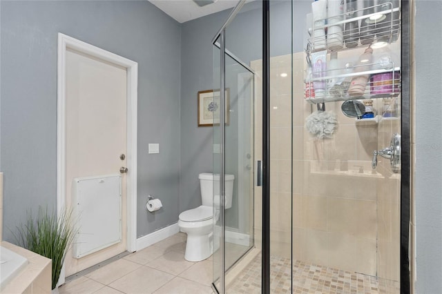 bathroom with walk in shower, toilet, and tile patterned flooring