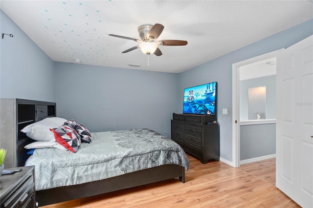 bedroom featuring ceiling fan and light wood-type flooring