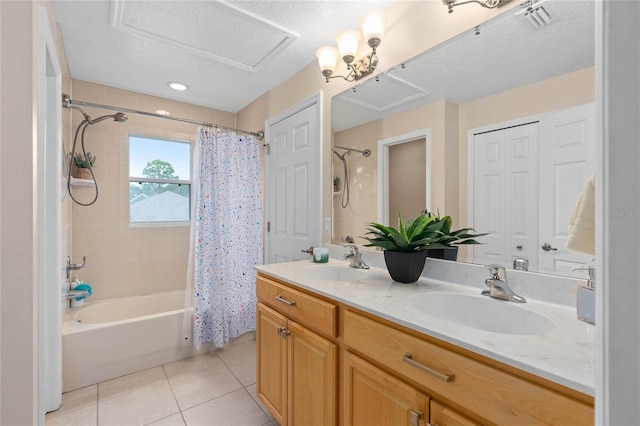 bathroom featuring shower / tub combo with curtain, tile patterned floors, and vanity