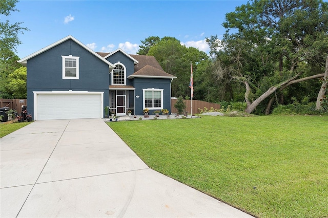 view of front of home featuring a garage and a front lawn