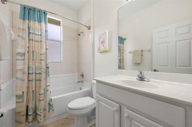 full bathroom featuring shower / tub combo with curtain, vanity, tile patterned floors, and toilet