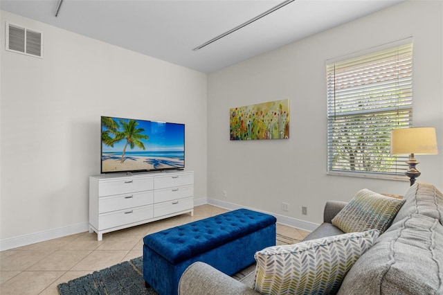 living room featuring light tile patterned floors