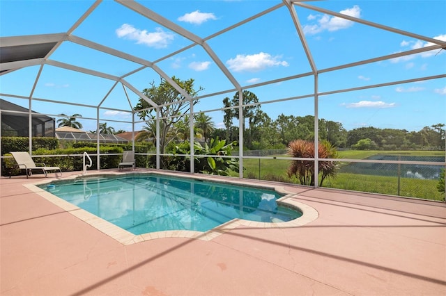 view of pool with a lanai and a patio area