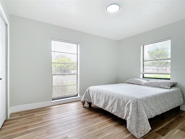 bedroom featuring hardwood / wood-style floors