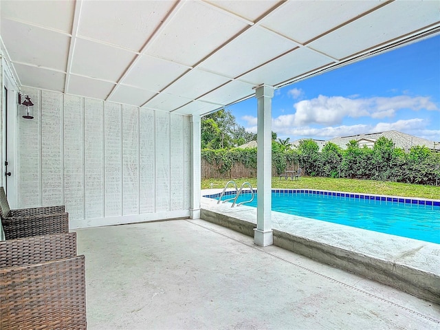 view of swimming pool featuring a patio area