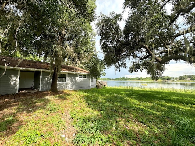 view of yard with a water view