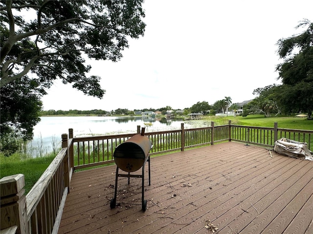 deck featuring a water view