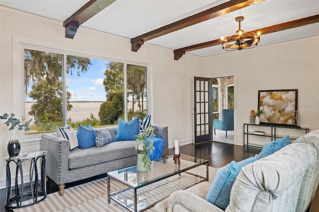 living room featuring baseboards, a notable chandelier, beamed ceiling, and wood finished floors