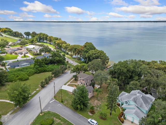 birds eye view of property with a residential view and a water view