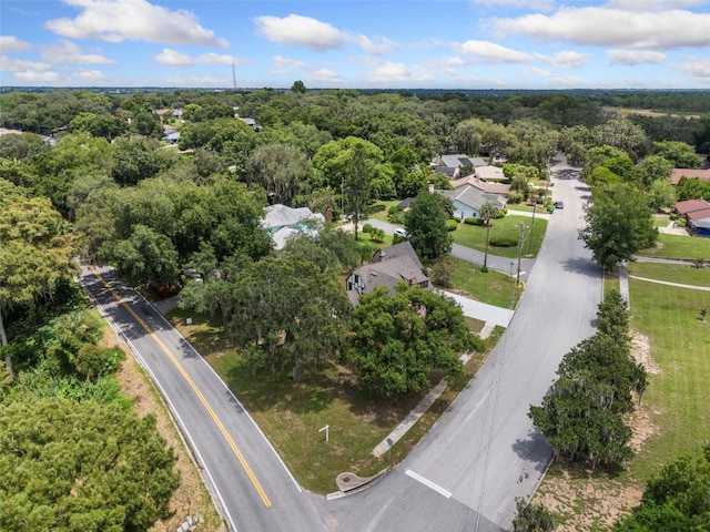 drone / aerial view with a view of trees