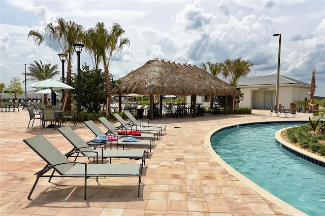 view of pool featuring a gazebo and a patio