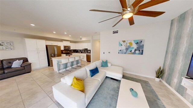 living room featuring light tile patterned flooring