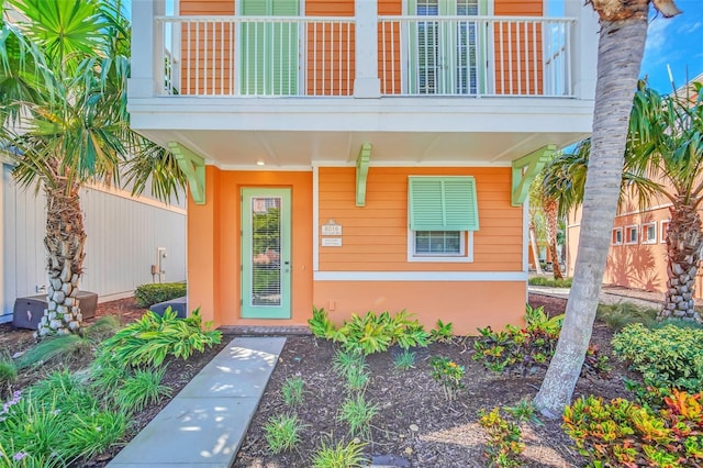 doorway to property featuring a balcony