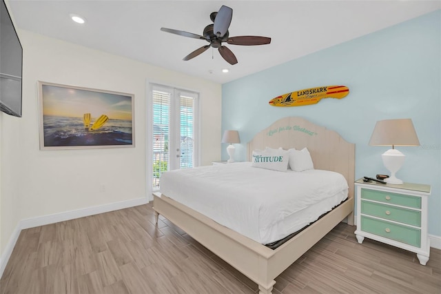 bedroom featuring light hardwood / wood-style flooring, ceiling fan, and access to exterior