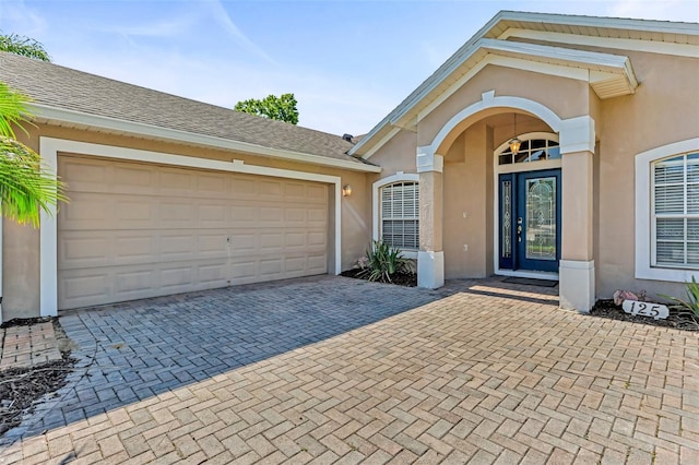 view of front of property featuring a garage