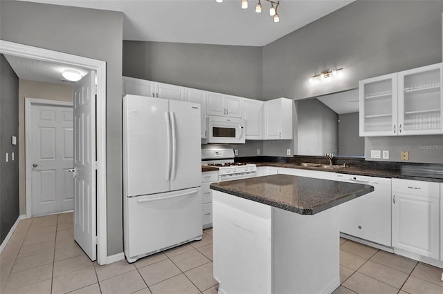 kitchen featuring a center island, sink, white cabinets, and white appliances