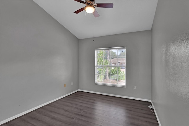 unfurnished room featuring dark wood-type flooring and ceiling fan