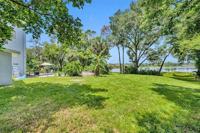 view of yard with a water view