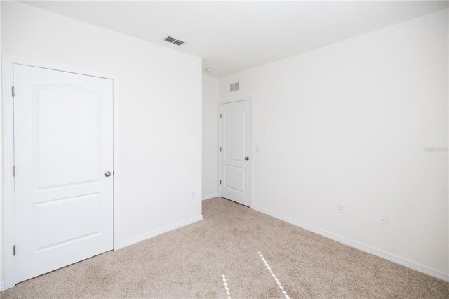 interior space with light colored carpet