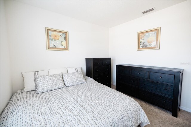 bedroom featuring carpet