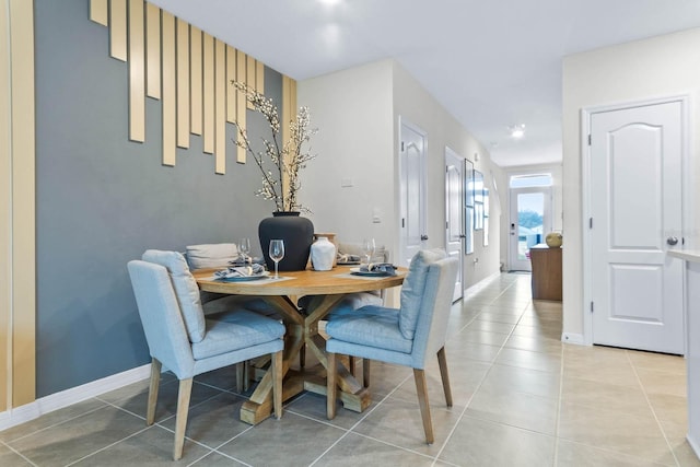 view of tiled dining space