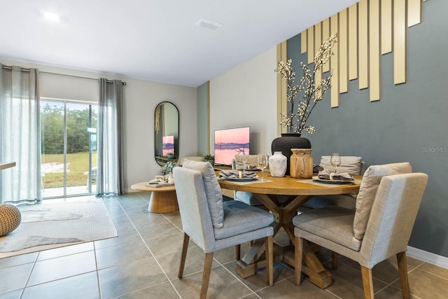 dining room with light tile patterned floors