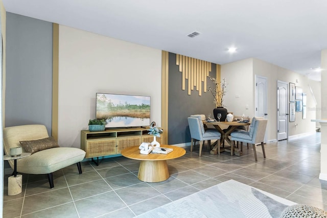 sitting room featuring tile patterned floors