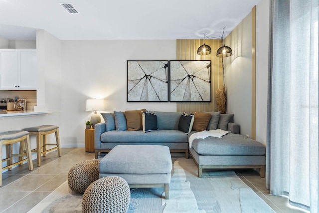 living room featuring light tile patterned floors