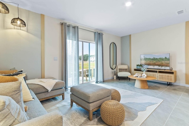 living room featuring tile patterned flooring