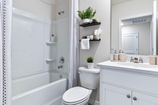 full bathroom featuring toilet, vanity, and shower / tub combo