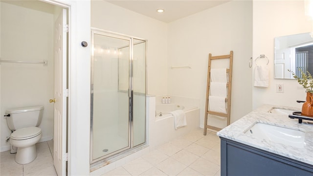 full bathroom with tile patterned floors, toilet, vanity, and shower with separate bathtub