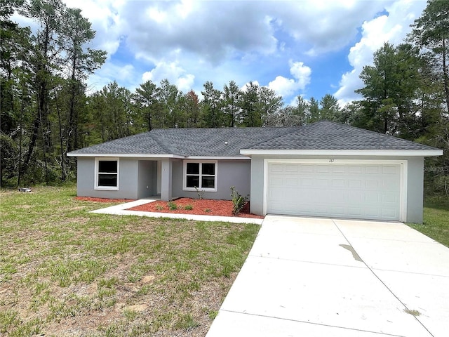 161 Fisher Crse, Ocklawaha, FL 32179 - ranch-style home with stucco siding, roof with shingles, a garage, concrete driveway, and a front yard