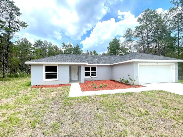 161 Fisher Crse, Ocklawaha, FL 32179 - view of front of house with an attached garage, stucco siding, driveway, a shingled roof, and a front lawn