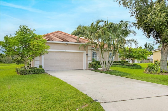 mediterranean / spanish-style house with a garage and a front yard