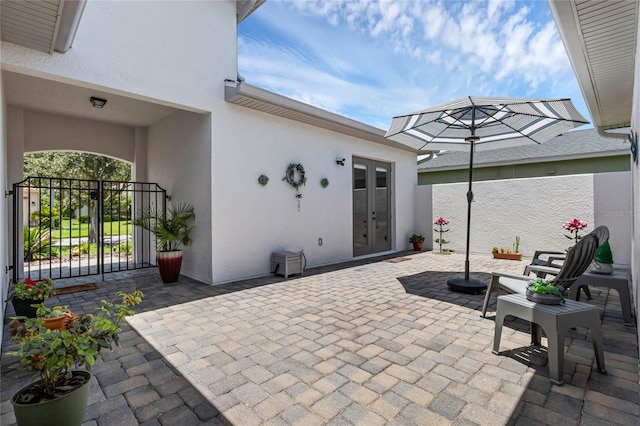 view of patio / terrace featuring french doors