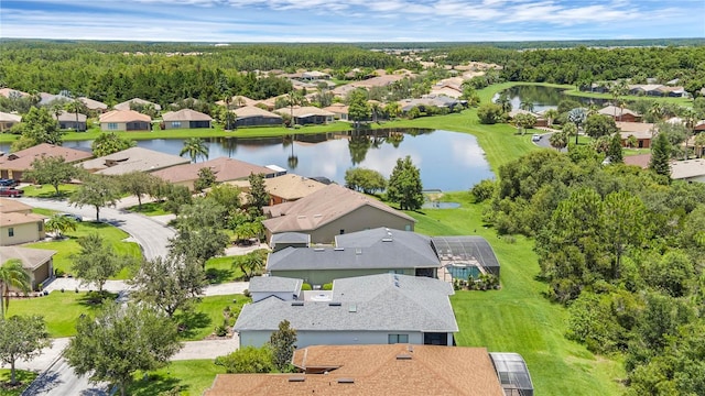 drone / aerial view with a water view