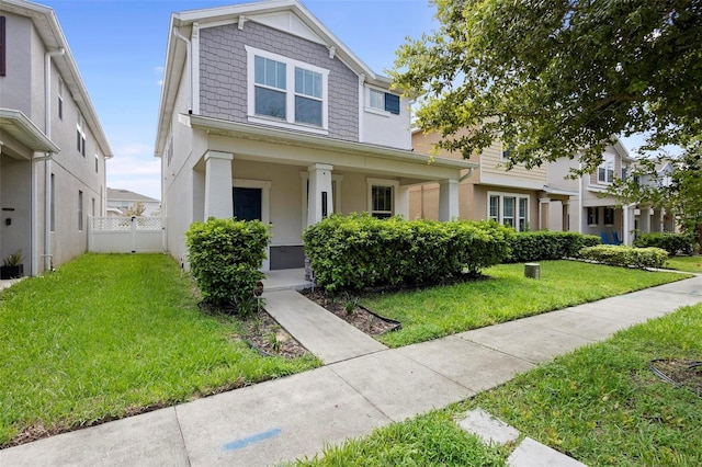 view of front of property with a front lawn