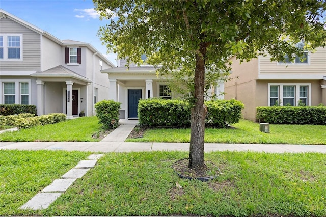 view of front of house with a front lawn