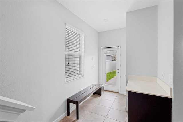 mudroom featuring light tile patterned flooring