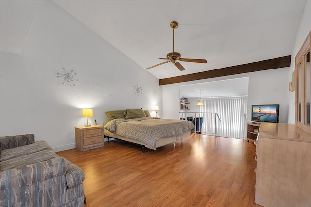 bedroom with lofted ceiling, ceiling fan, and light wood-type flooring