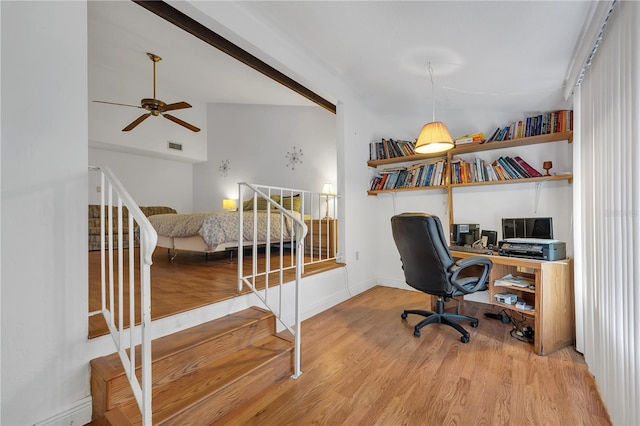 office space featuring lofted ceiling and wood-type flooring