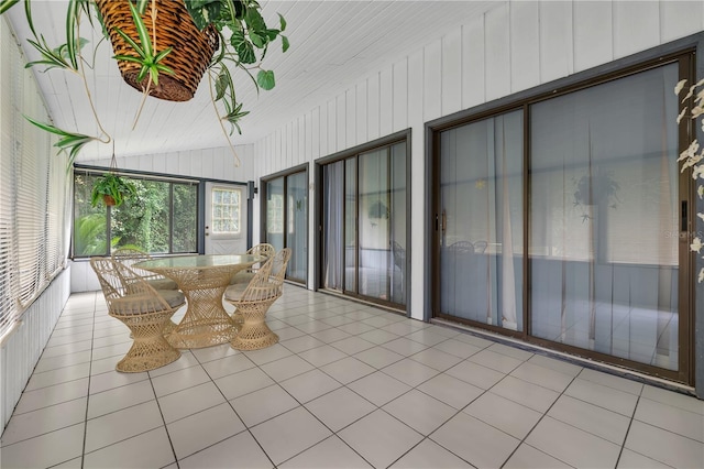 sunroom / solarium with lofted ceiling