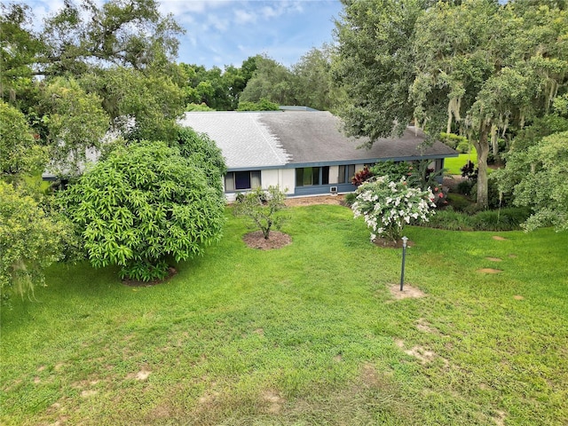 exterior space featuring a front lawn