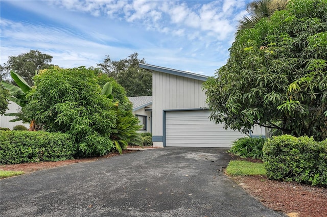 exterior space with a garage