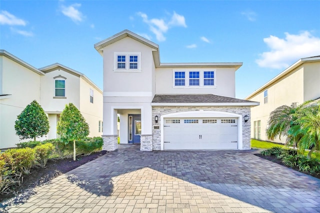 view of front of home with a garage