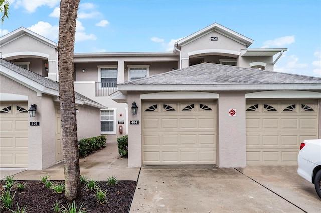 view of front of property with a garage