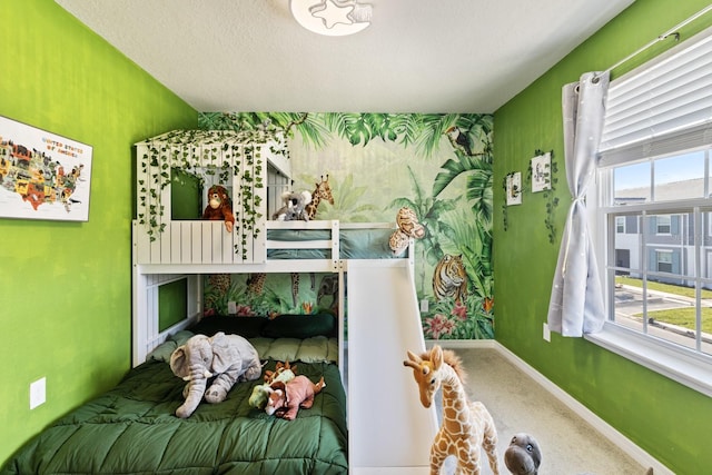 carpeted bedroom with a textured ceiling