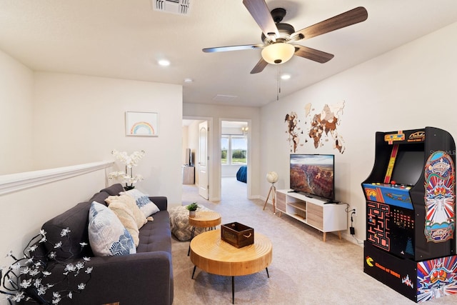 7143 Oakmoss Loop, Davenport, FL 33837 - carpeted living area with a ceiling fan and recessed lighting