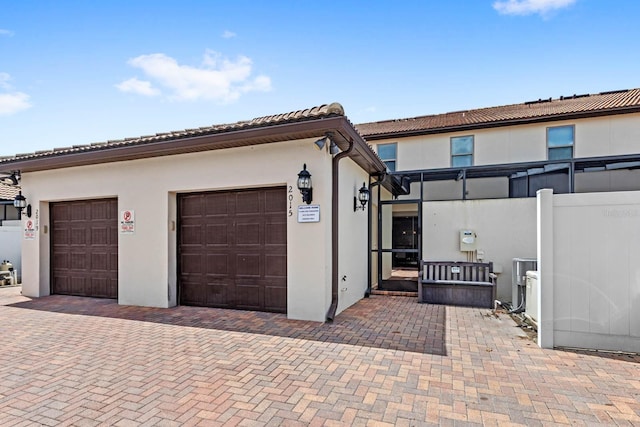 view of front of property with a garage